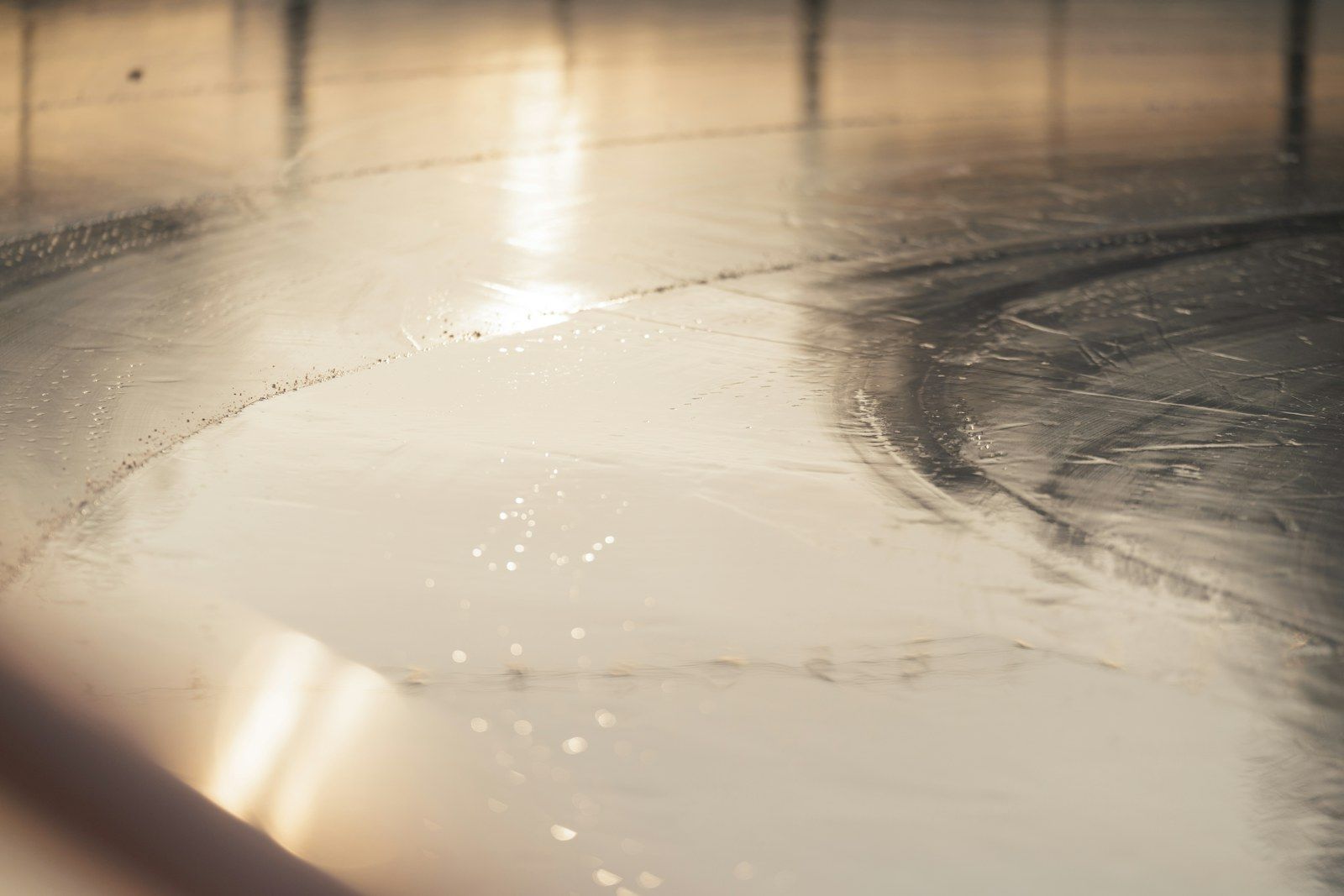 Water spread across a shiny floor